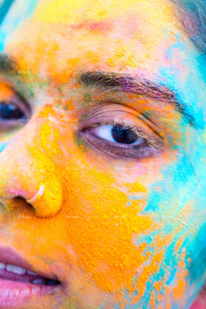 Portrait of a woman at Holi festival