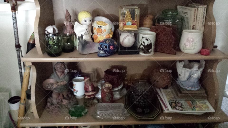 my bookshelf has become a depository of all things knick knack