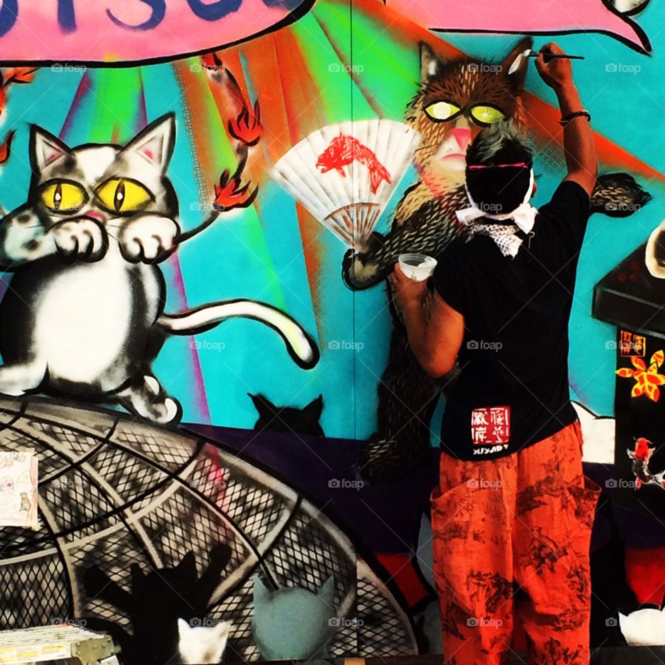 Cats Art. Street artist doing his thing at the Internet cat video festival in Minnesota. 