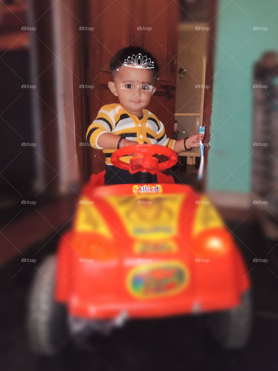 cute baby playing with car