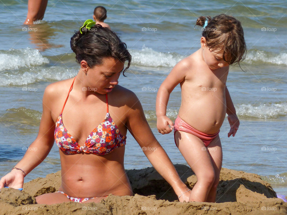 Mother and Daughter. Family at the beach 