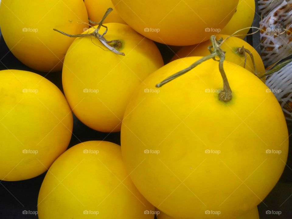 Fresh golden melon on market