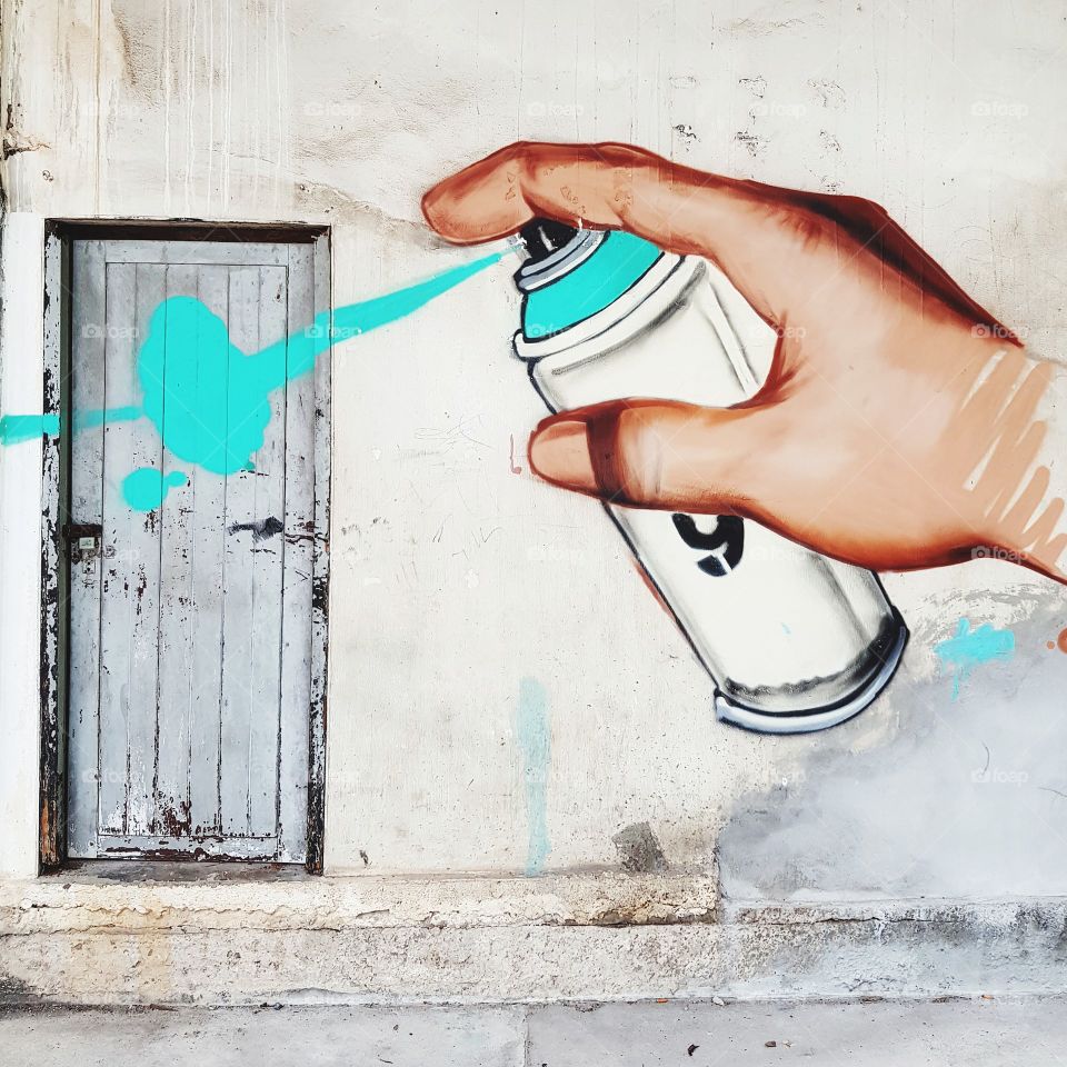Door and graffiti art on wall