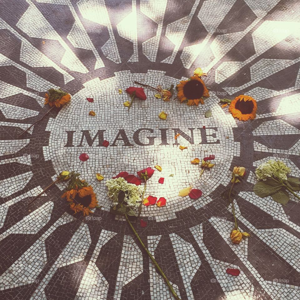 Strawberry Fields Forever . First trip to New York City for a fashion editorial (photographer). Had to stop in Central Park to see imagine. Magical!