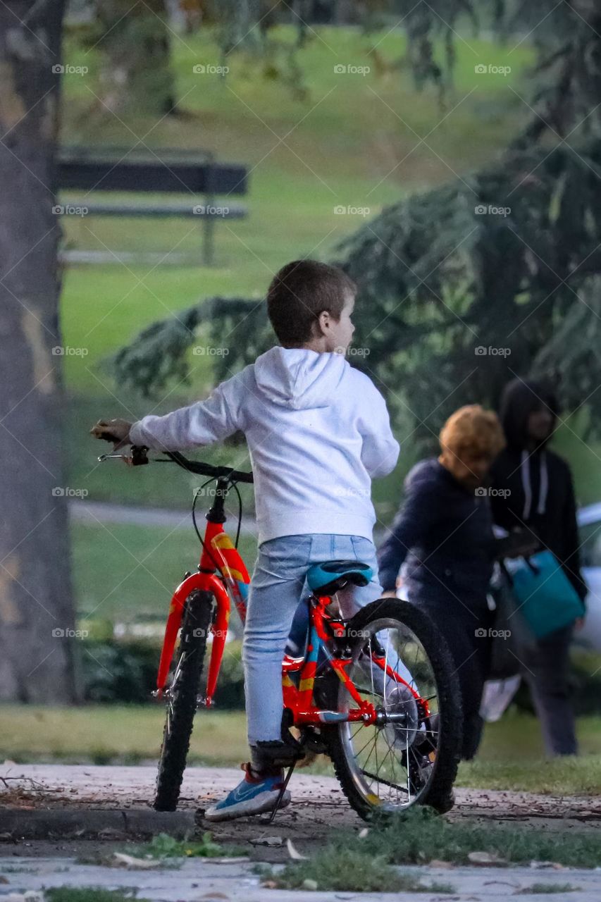 Boy riding a bicycle