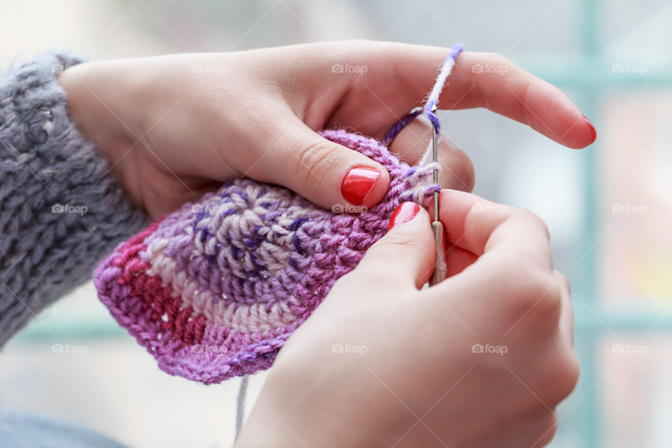 Woman hand knitting wool