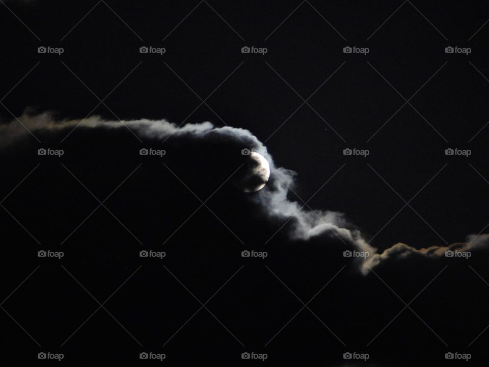 moon inside clouds