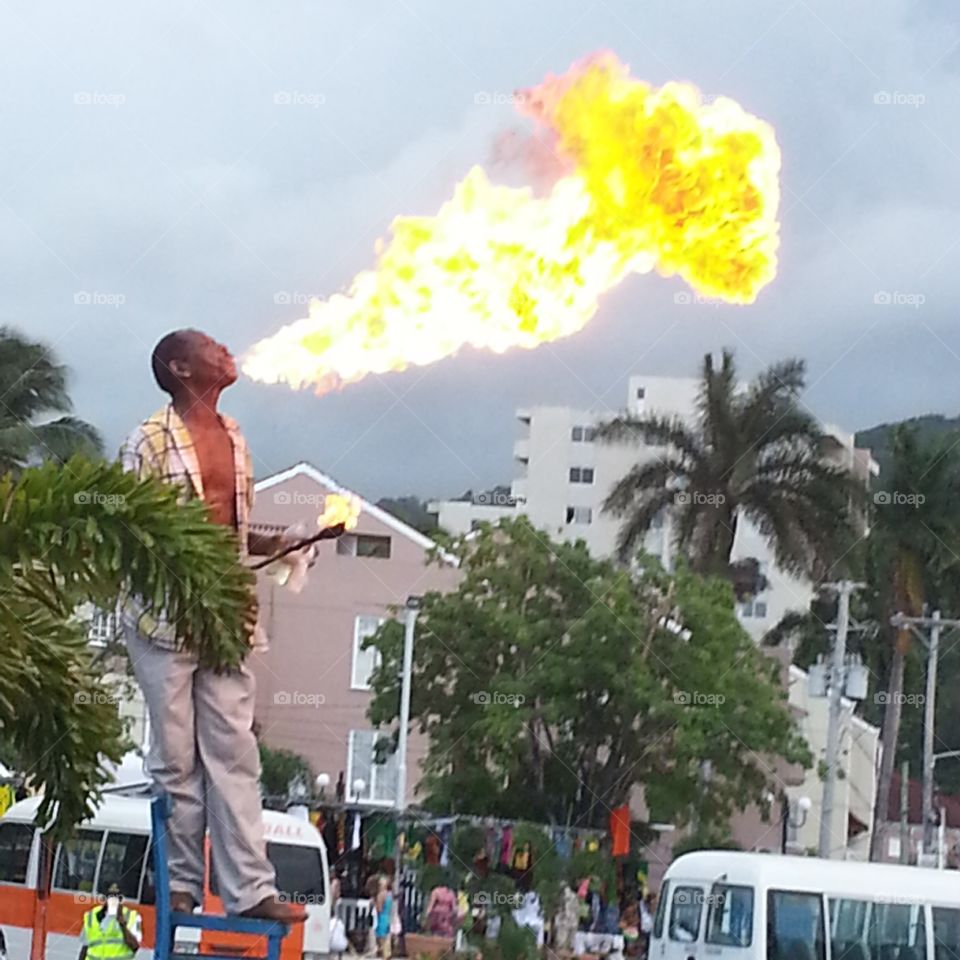 Jamaican Fire blower. Jamaican street performer