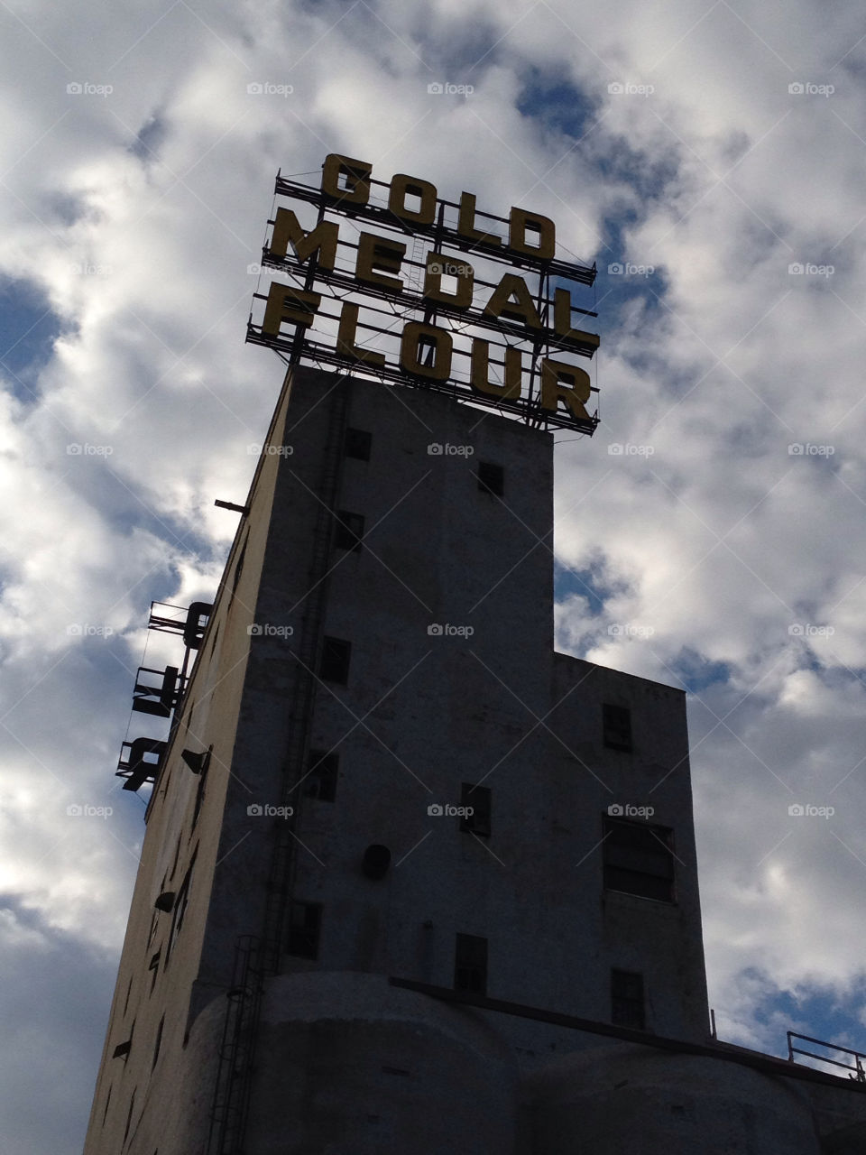 flour sign clouds gold by maryannesh