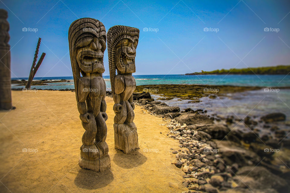 Koi in Pu’uhonua O Honaunai National Historic Park, Big Island Hawaii Golden Sand blue ocean and clear sky