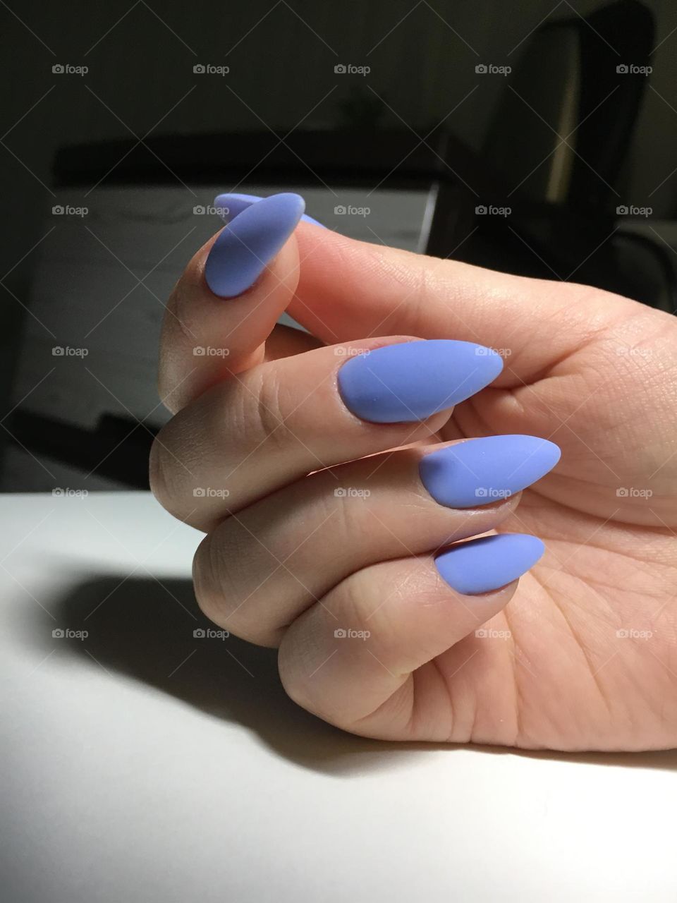 Painted nails, gel polish on nails, women's beautiful and neat manicure