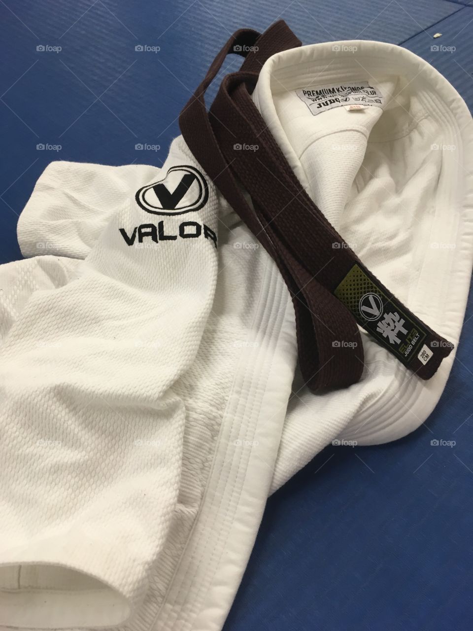 Valor gi and judo brown belt on the mats