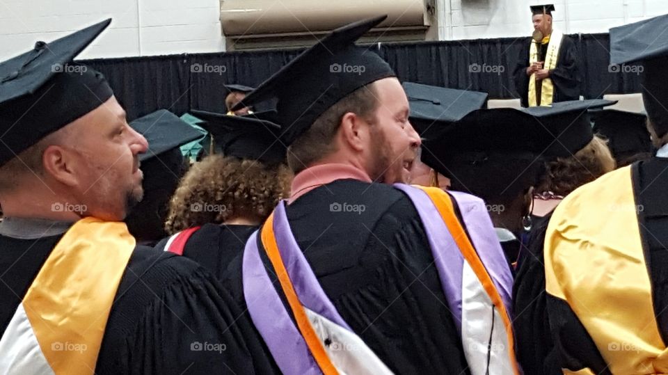 Group of graduate student wearing robe in convocation ceremony