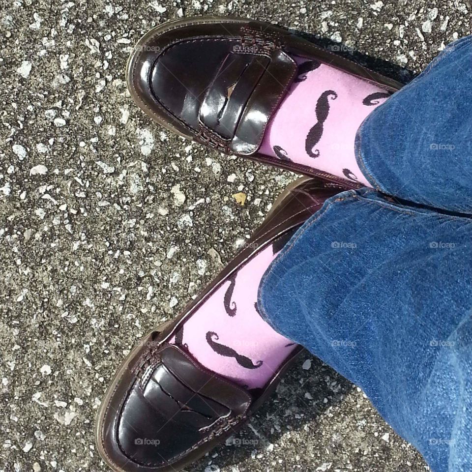 Moustache socks and penny loafers