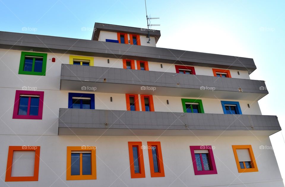 building with multicolored windows