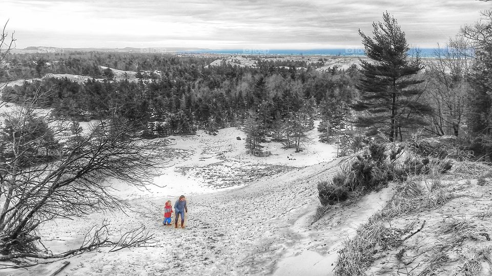 B&W hiking sand dunes by lake Michigan beach