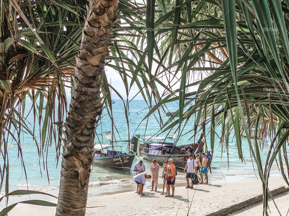 People traveling by the sea