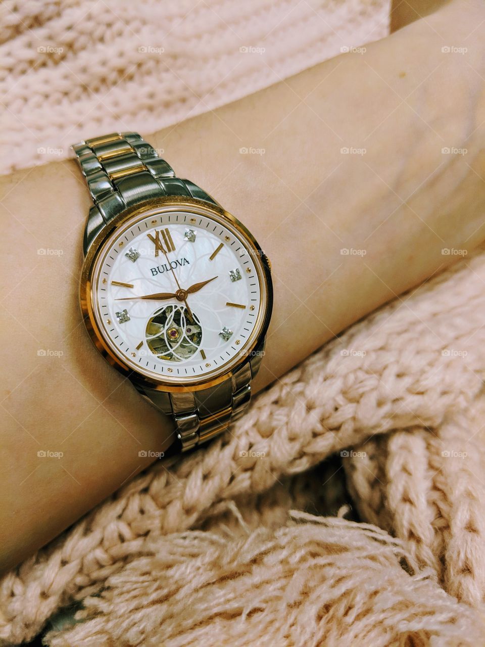 Bulova watch with rose gold details