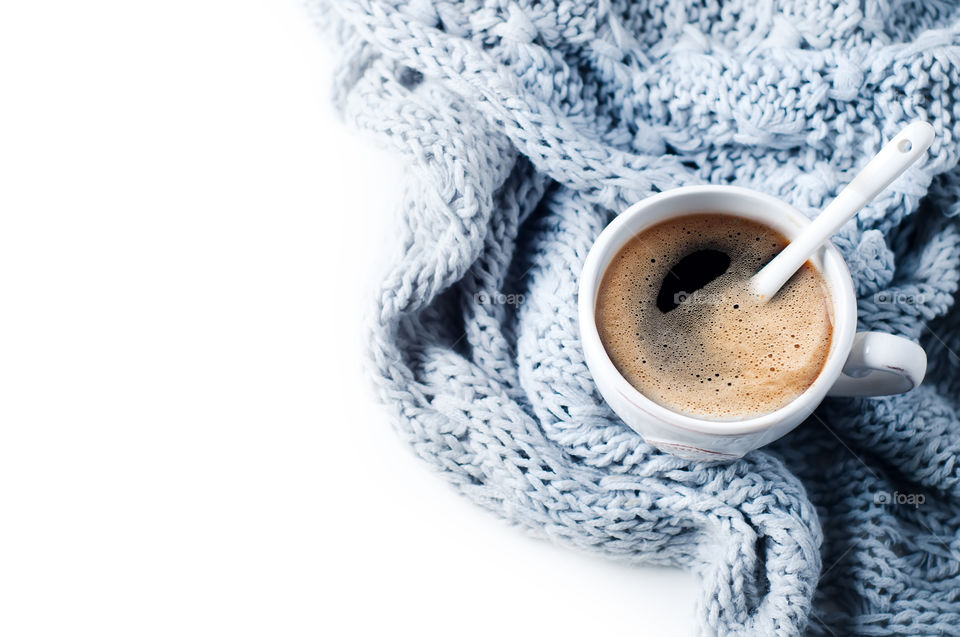 Coffee in cup on white background