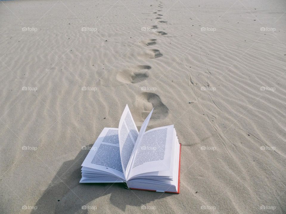 open book on the sand