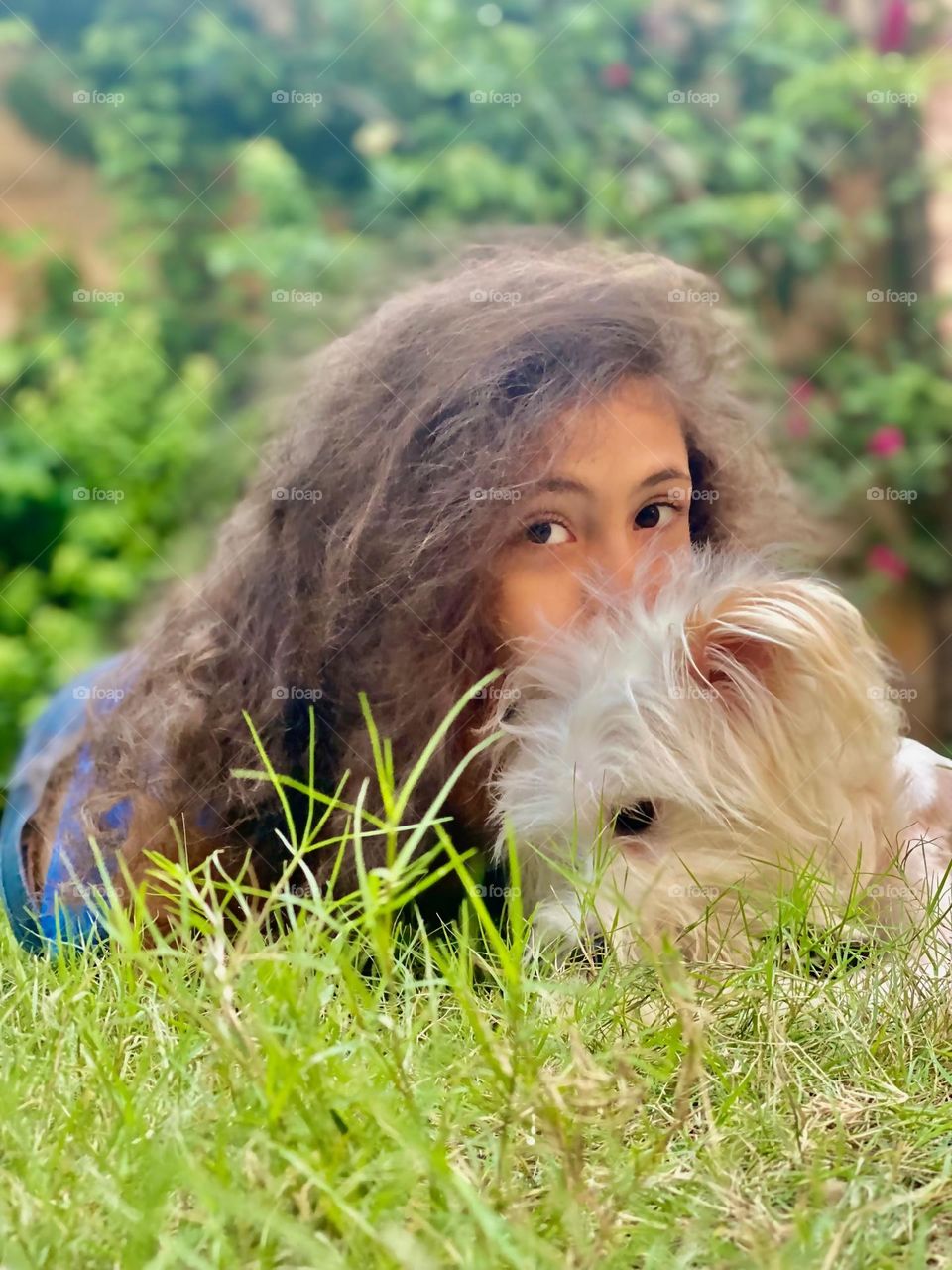 Girl with her puppy