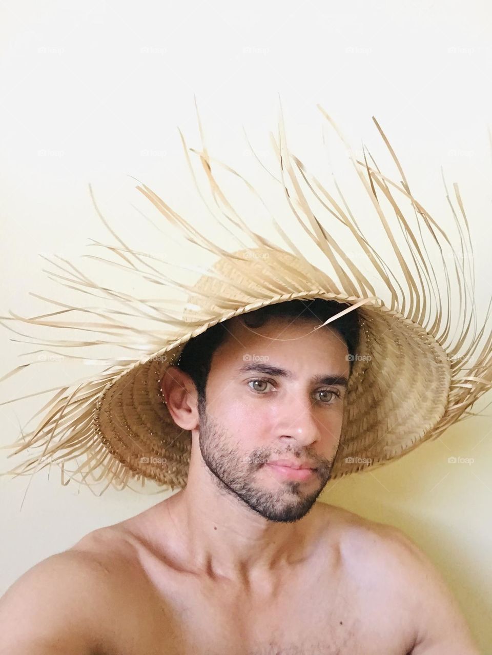 man with straw hat