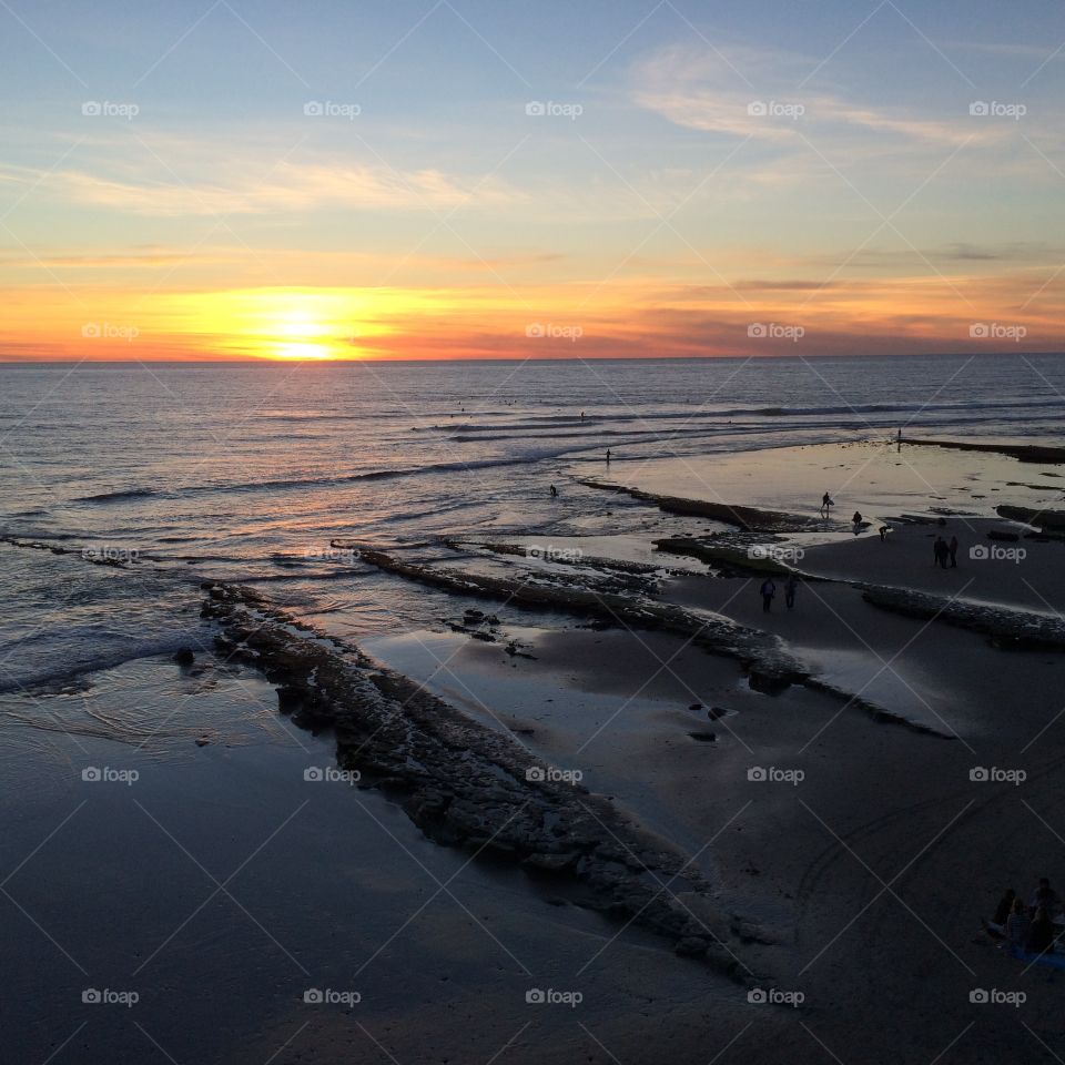 Dramatic sky over sea during sunset