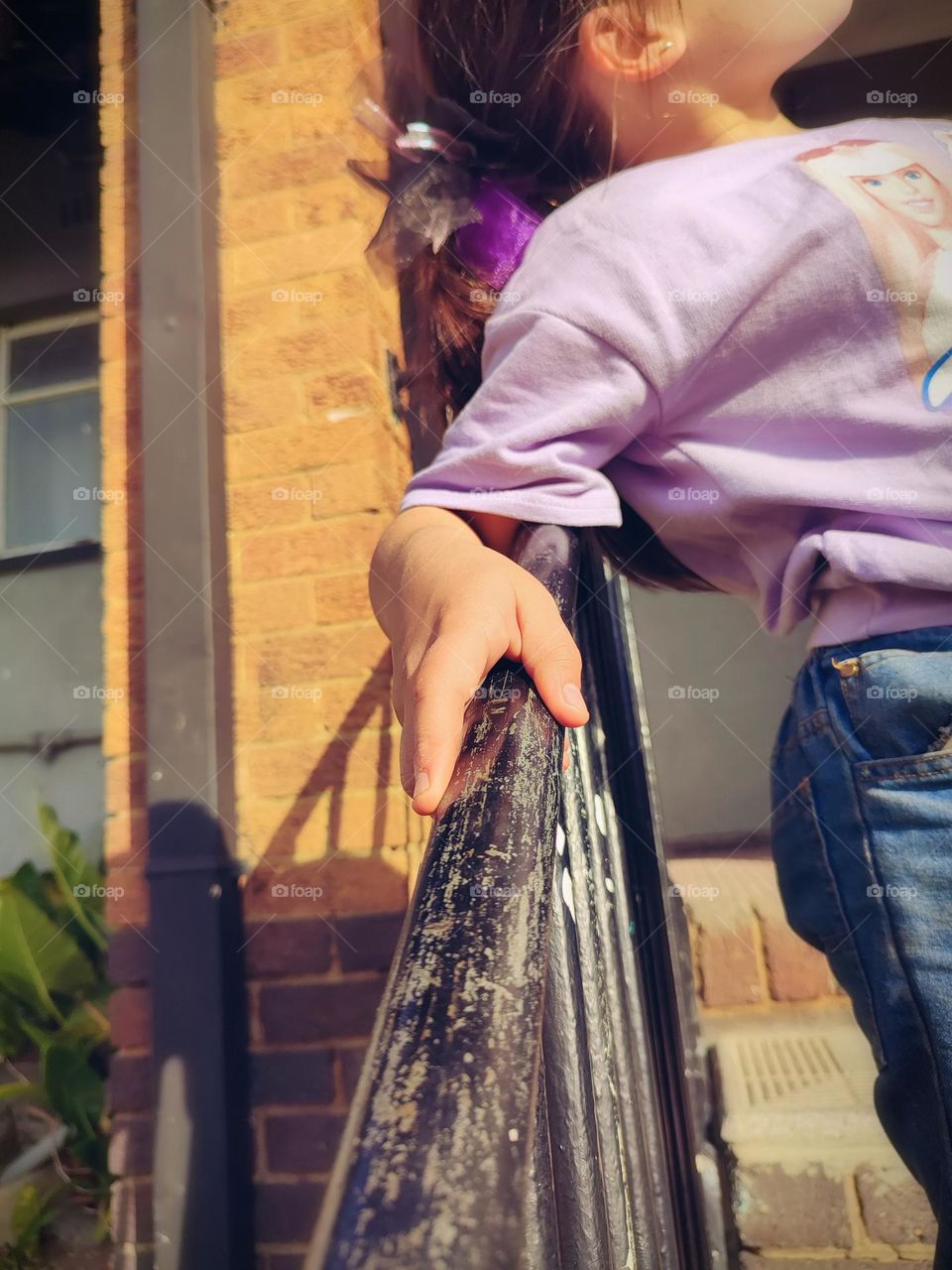 Hands on the railing