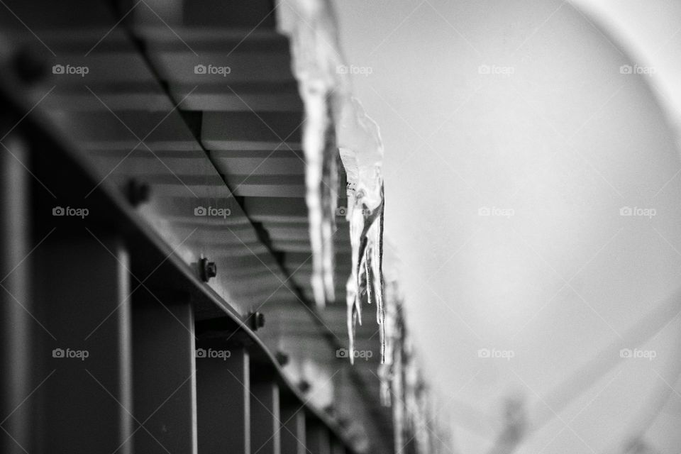 black&white ice on metal roof