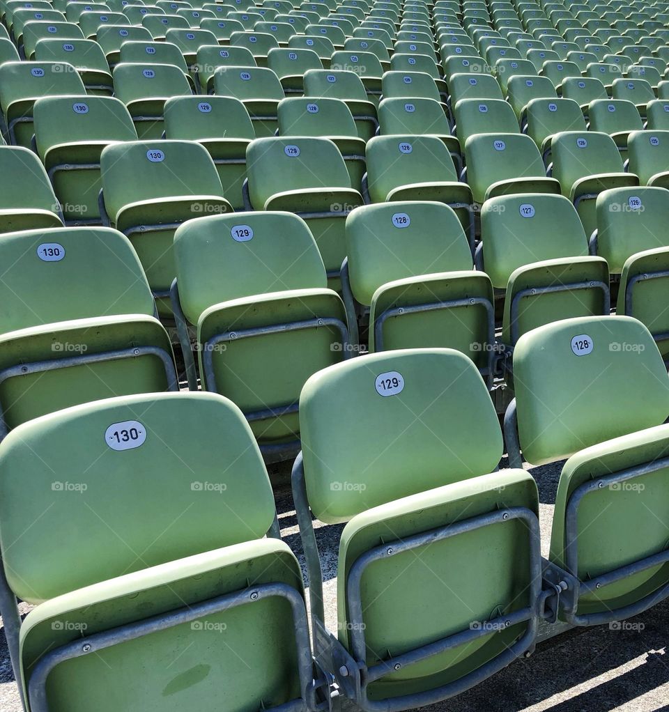 Many empty seats of an arena