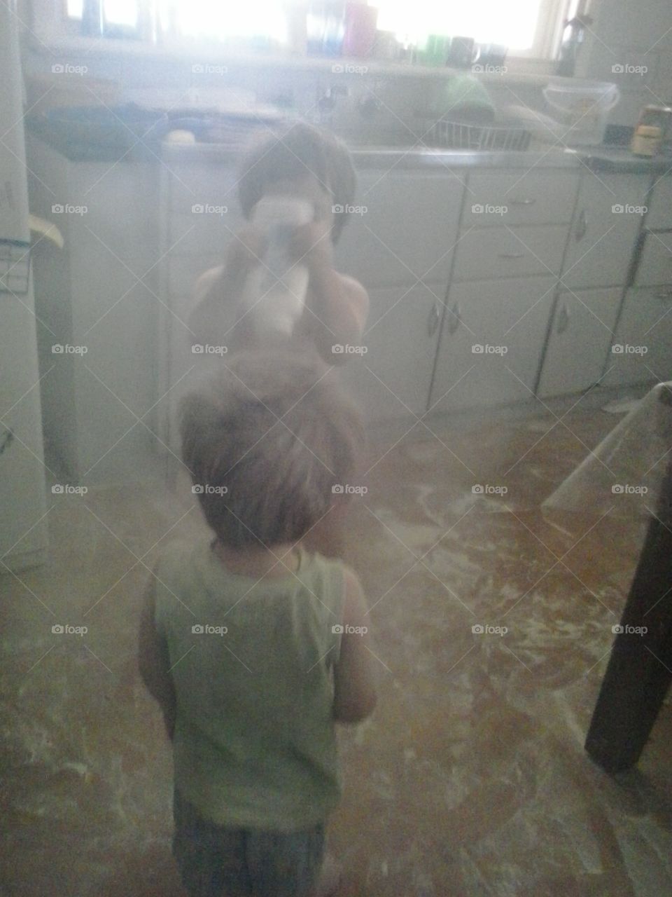 powder fight. i love ot when they make a mess like this. time to clean