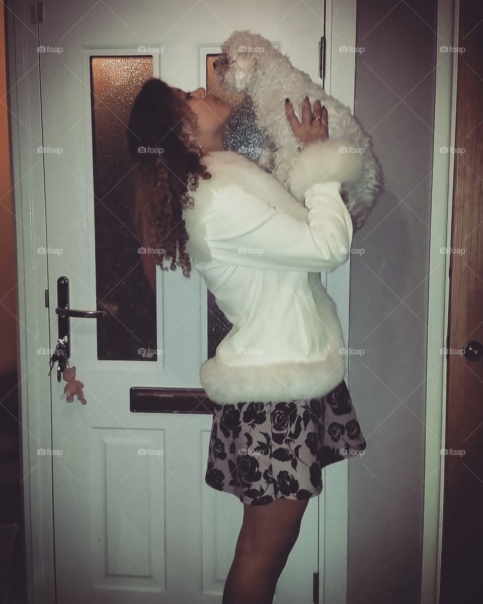 Puppy and pet owner. Showing the love and affection between two best friends.