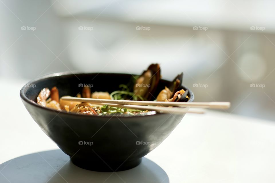 close-up of a plate with Asian cuisine