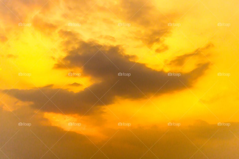 Photograph of vibrant cloudy sky at dusk dawn daytime snap in landscape style. Useful for background wallpaper screen saver e-cards website to decorate interior. Travel, Vacation, freedom, simplicity Holiday Concept. Subject is inspiration hopeful br