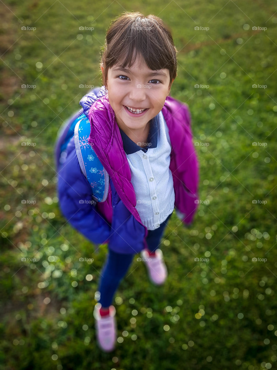 Cute little girl is going to school