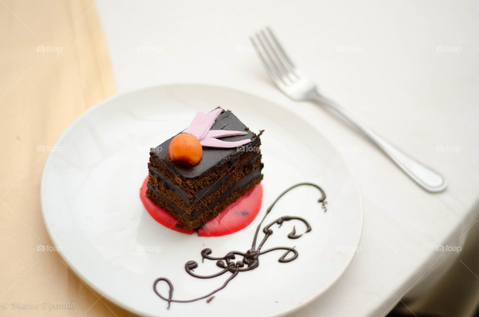 Black cake. A black cake taken during fine dining session