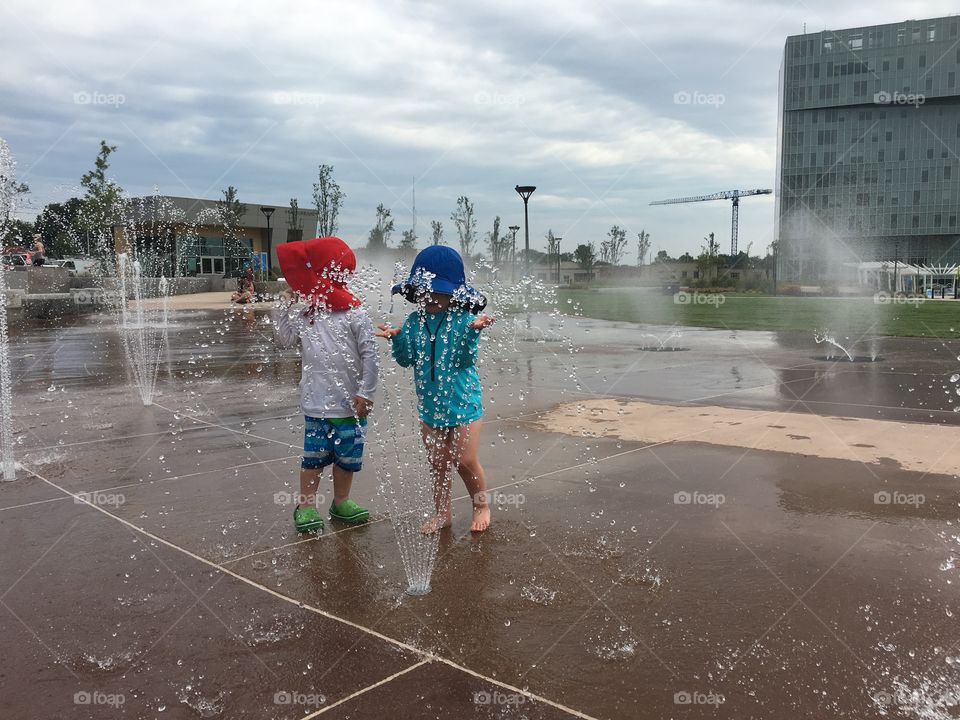 Children playing in the fountain in downtown Charlotte
 