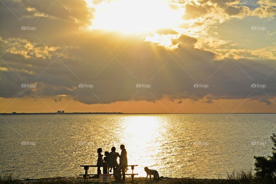 Sunrise vs Sunset - Family picnic -The Golden Hour offers plenty of opportunities for great photos, and the really beautiful thing is that it happens twice a day!  Most photographers agree that this time of day is THE best time to photograph the sun.