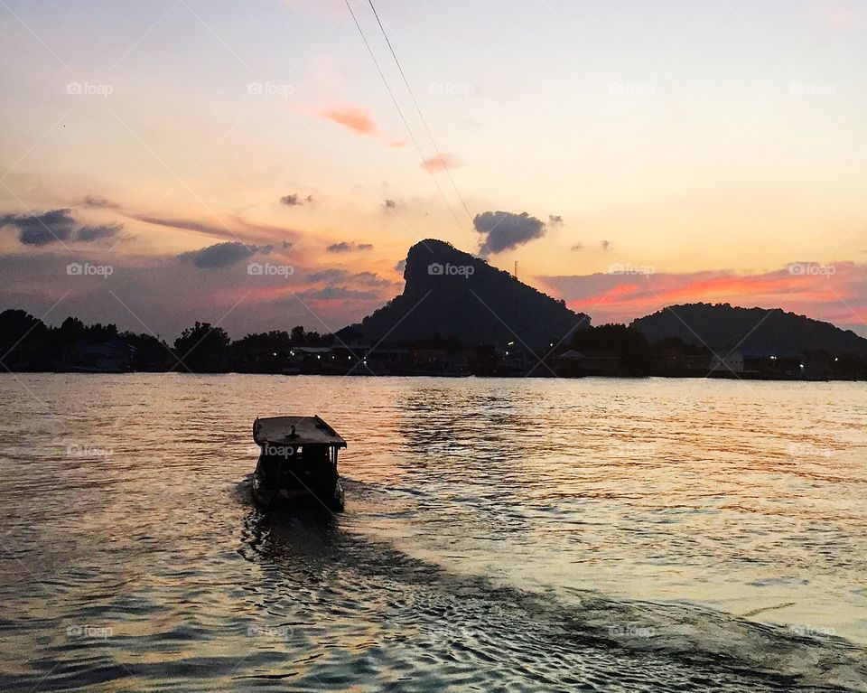 Boat on river in evening