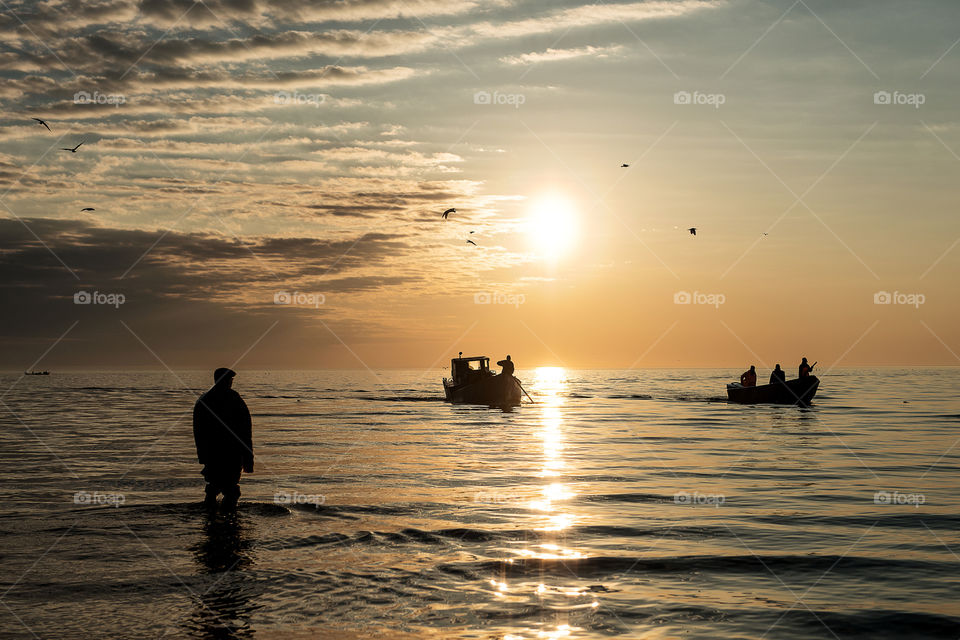 Seascape, fishermens returning from morning fishing
