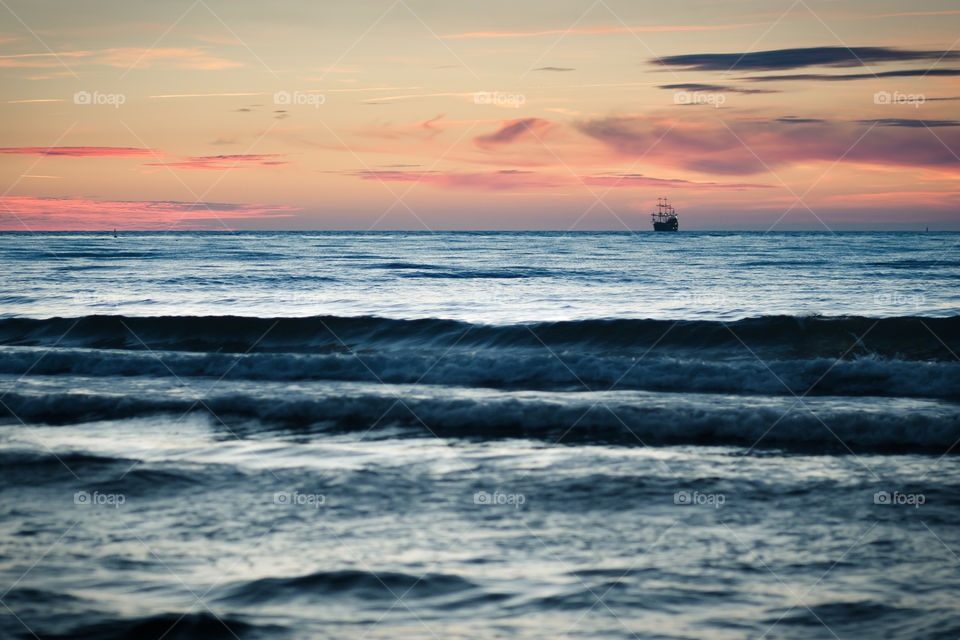 Sunset by the sea