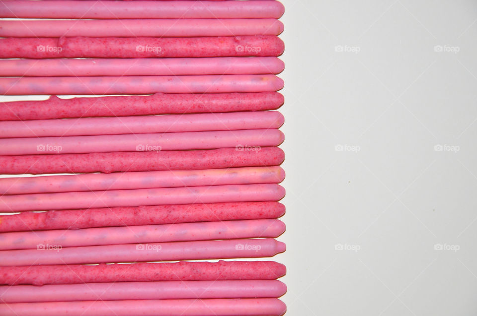 Strawberry cream covered biscuit sticks