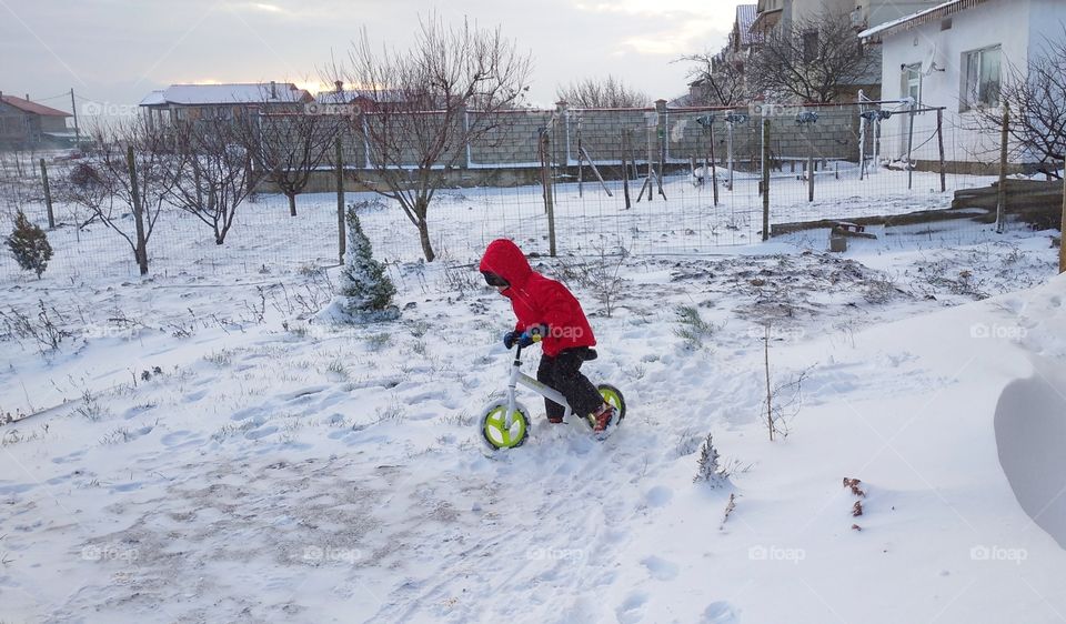 Riding a bike in the snow