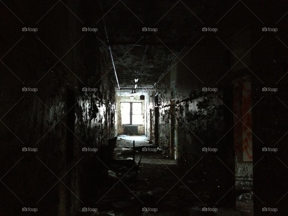 Creepy hallway of an abandoned insane asylum in New York State.
