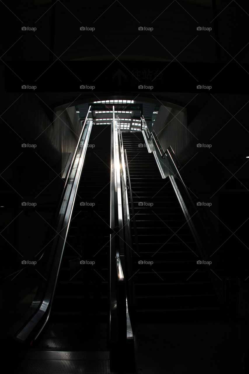 Stairway and escalator at the china bullet train station