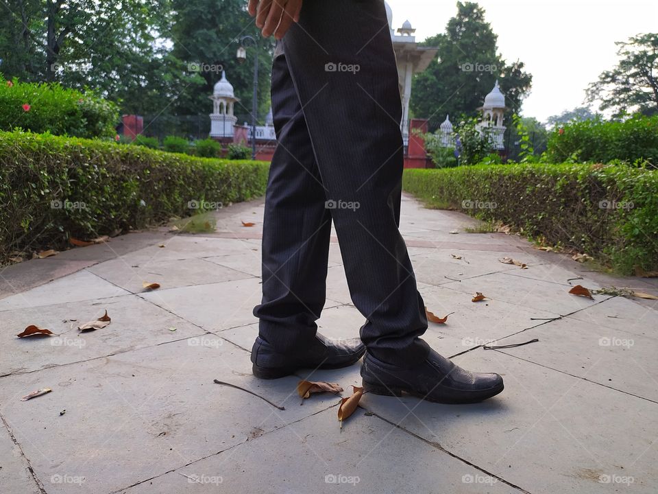 man standing in beautiful park in India