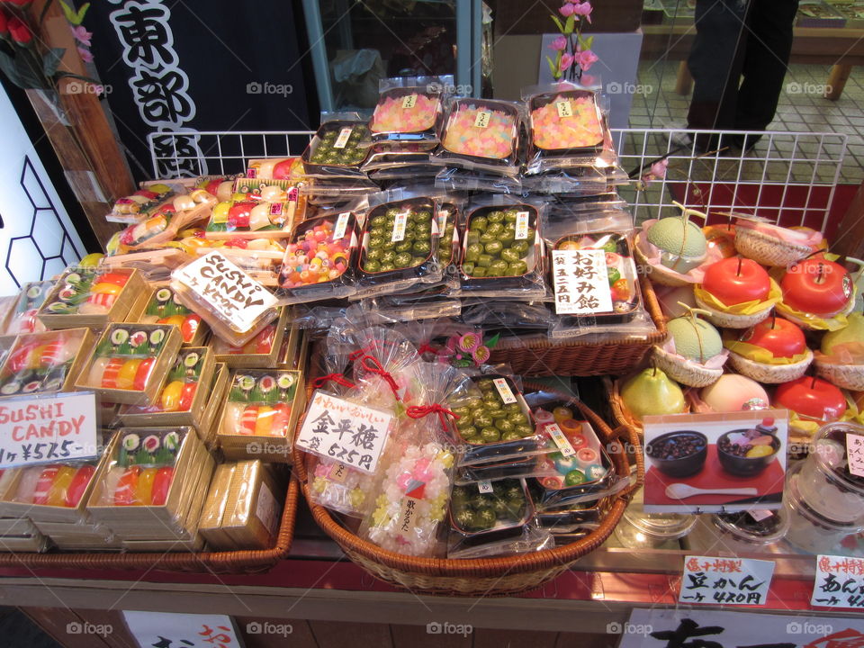 Asakusa, Tokyo, Japan.  Traditional sweets for sale as souvenirs outside Kaminarimon and Sensoji temple entrance.