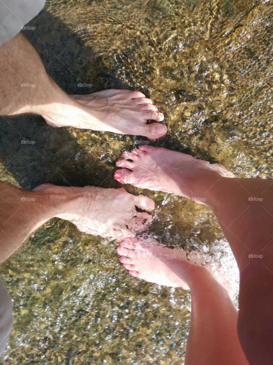 feet in the water