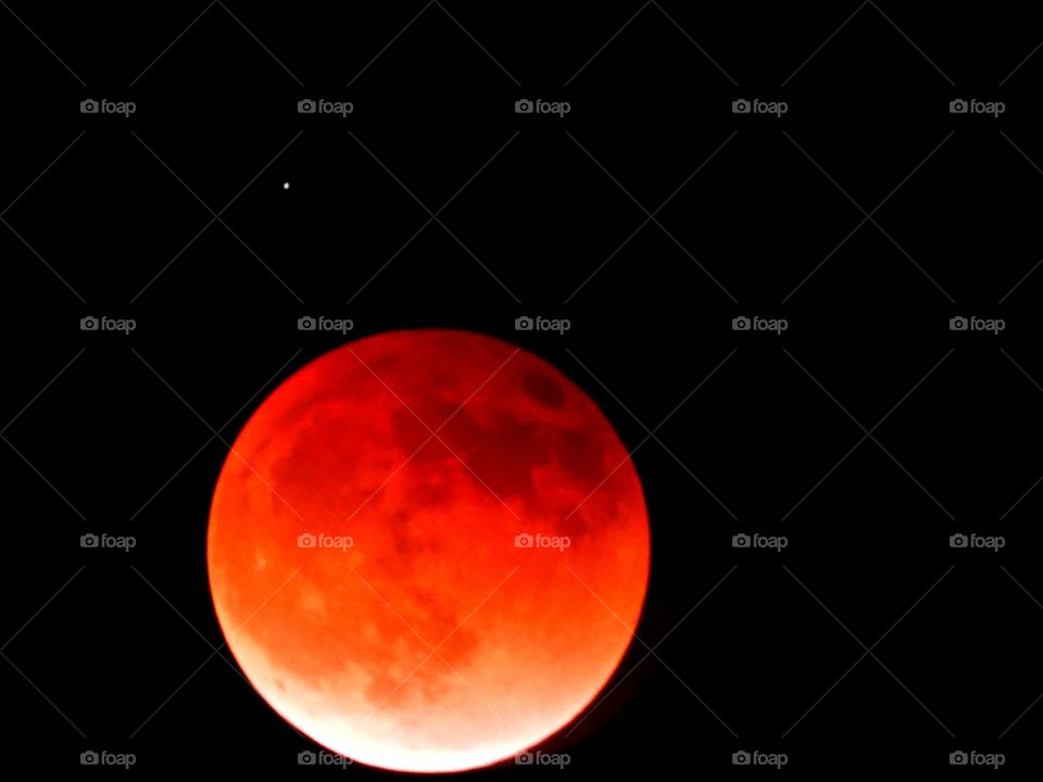 My photos of the Blood Moon, Total lunar eclipse on 15 May 2022 - Lunar eclipses occur when Earth aligns between the sun and the moon and casts a shadow across the lunar surface. The weather condition were very cloudy