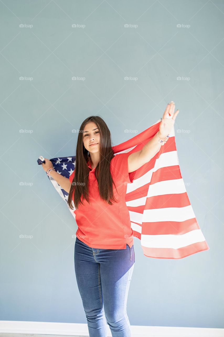 woman holding USA flag